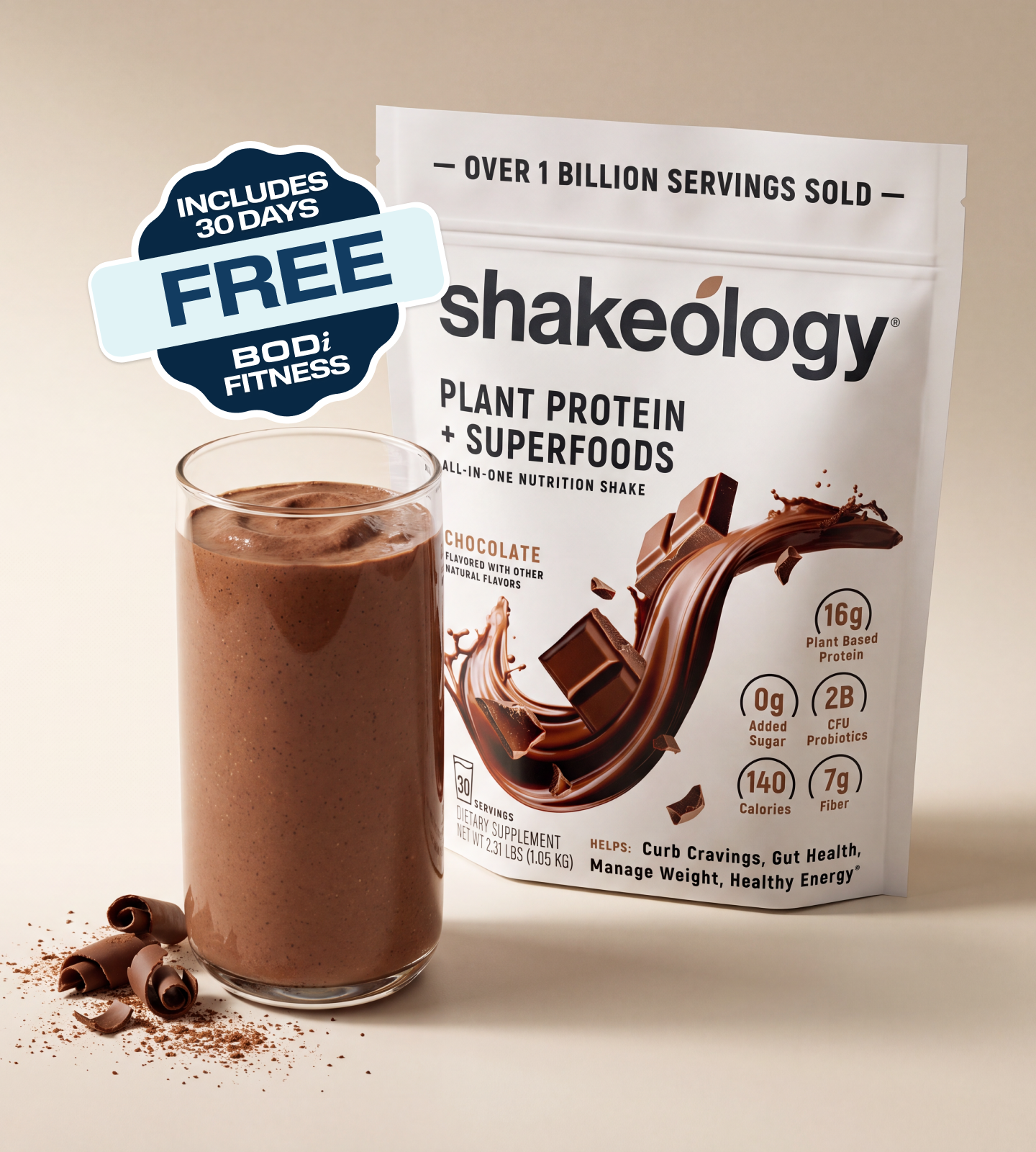 A bag of Shakeology Plant Protein + Superfoods chocolate flavor is shown next to a glass of chocolate protein shake, with chocolate curls and powder scattered on a beige surface. A blue badge on the left says it includes 30 days of body fitness.